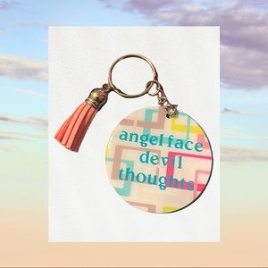 Handmade acrylic keychain with tassel